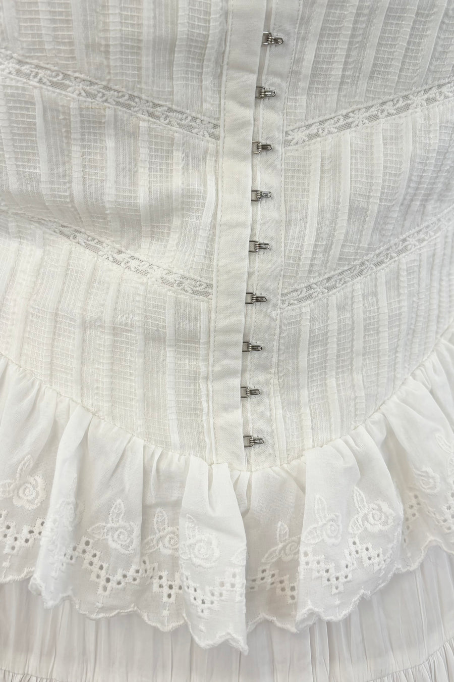 close up of Woman wearing a white dress