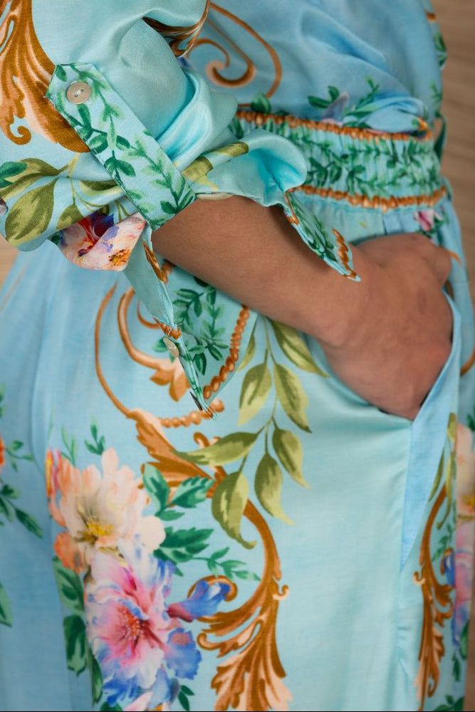 close-up of a turquoise floral patterned drawstring pants