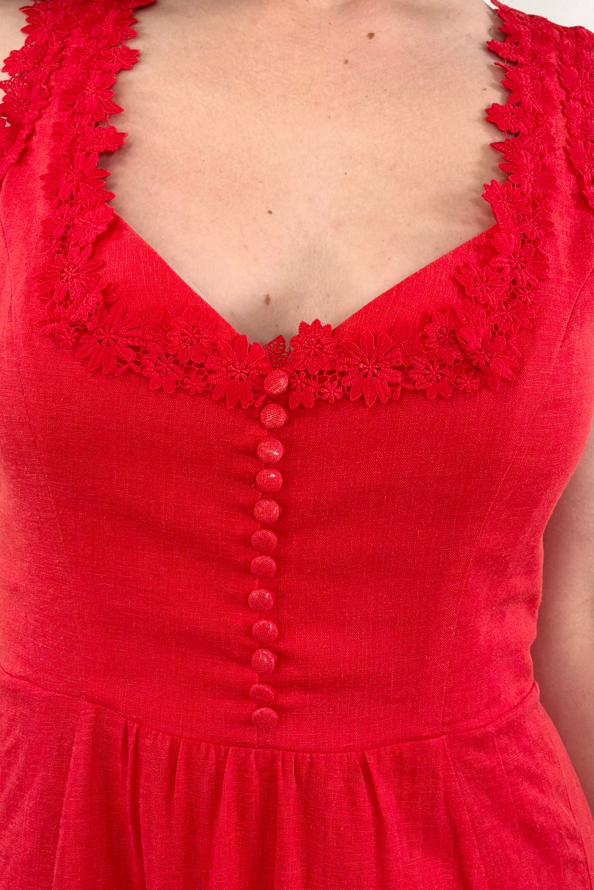Close up of flame red dress neck detail