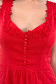 Close up of flame red dress neck detail