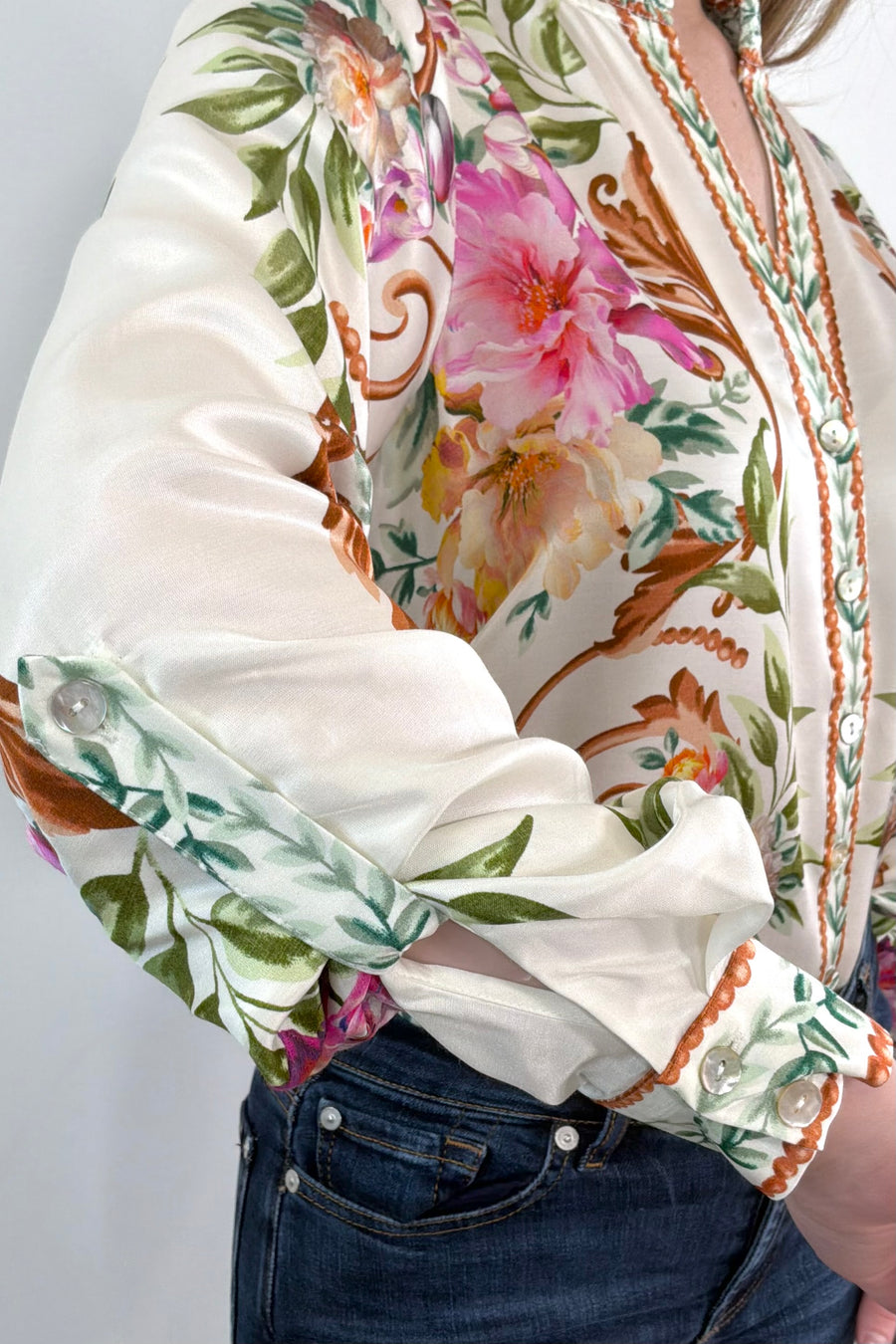 Close-up of  an ivory regency printed button down shirt