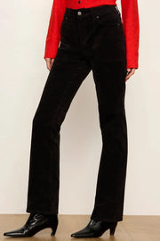 woman wearing black velvet high waisted jeans 