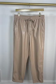 Front view of tan leather drawstring pants