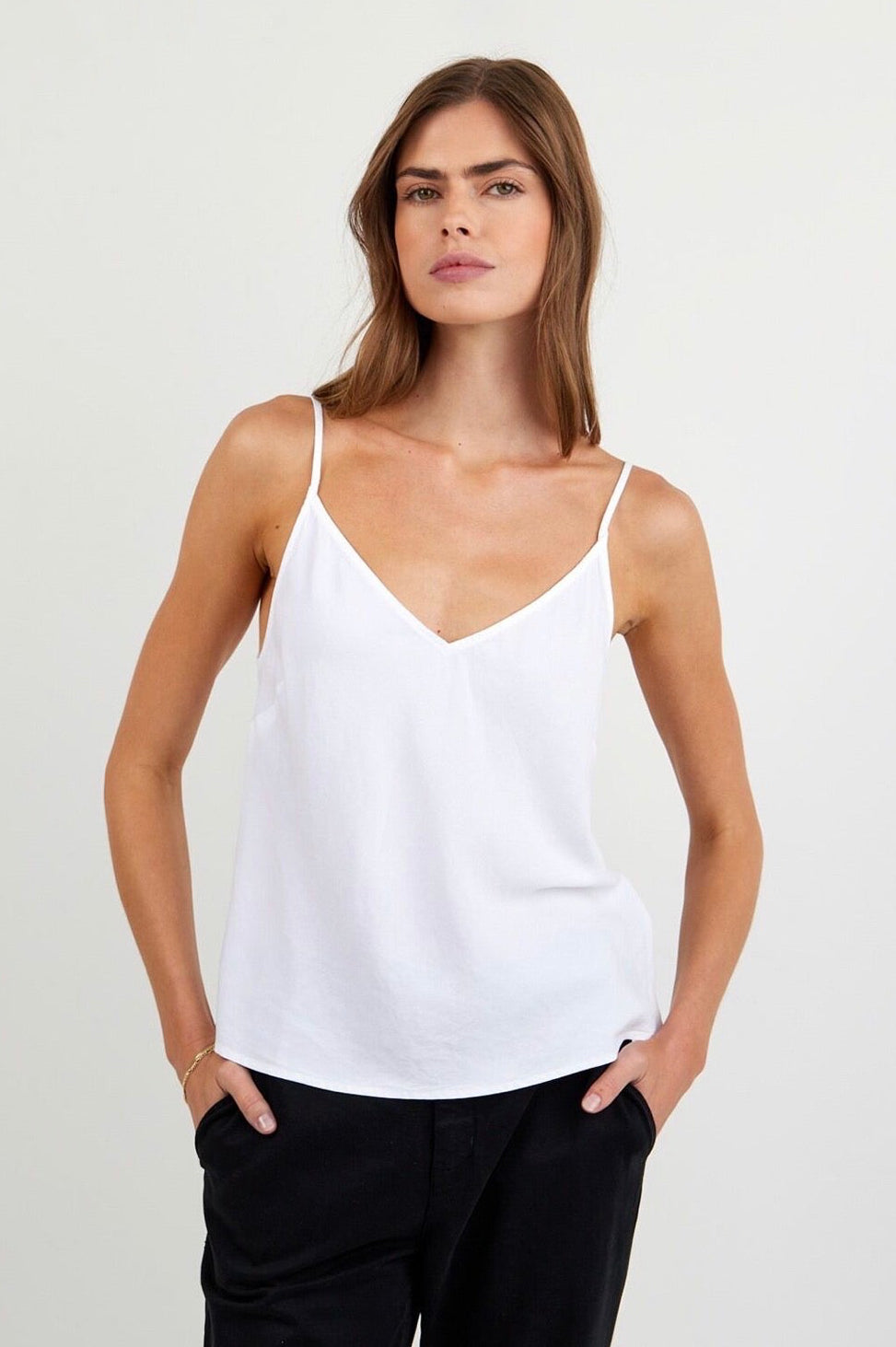 Woman weaning a white tank top