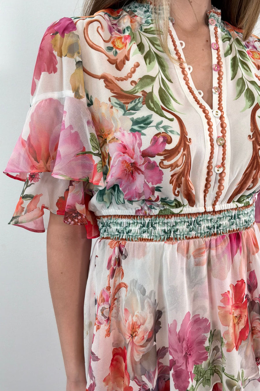 close-up of a floral tiered dress 
