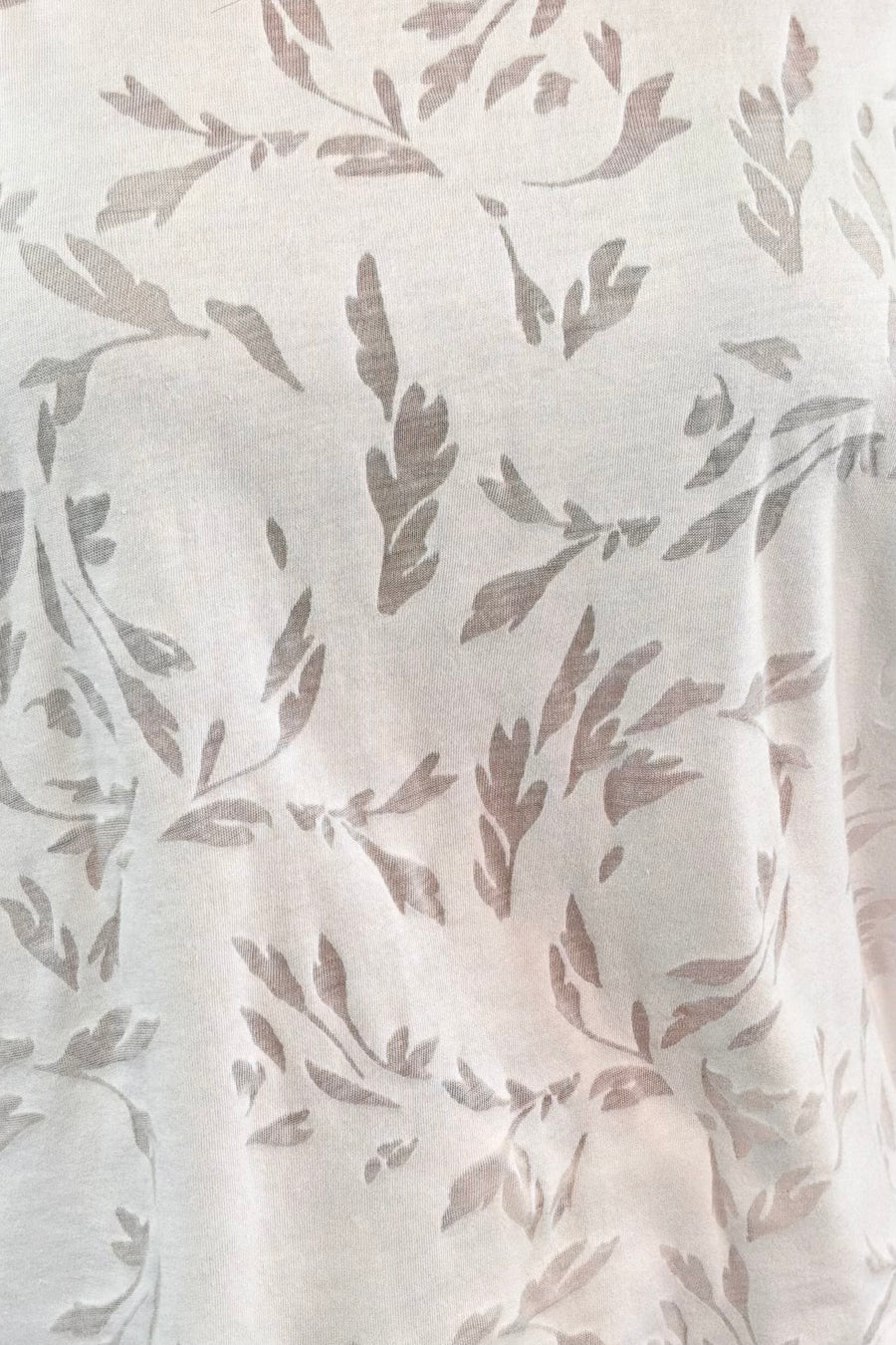 close-up of a white burn out tee