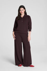 woman wearing a Spanx matching brown sweat suit