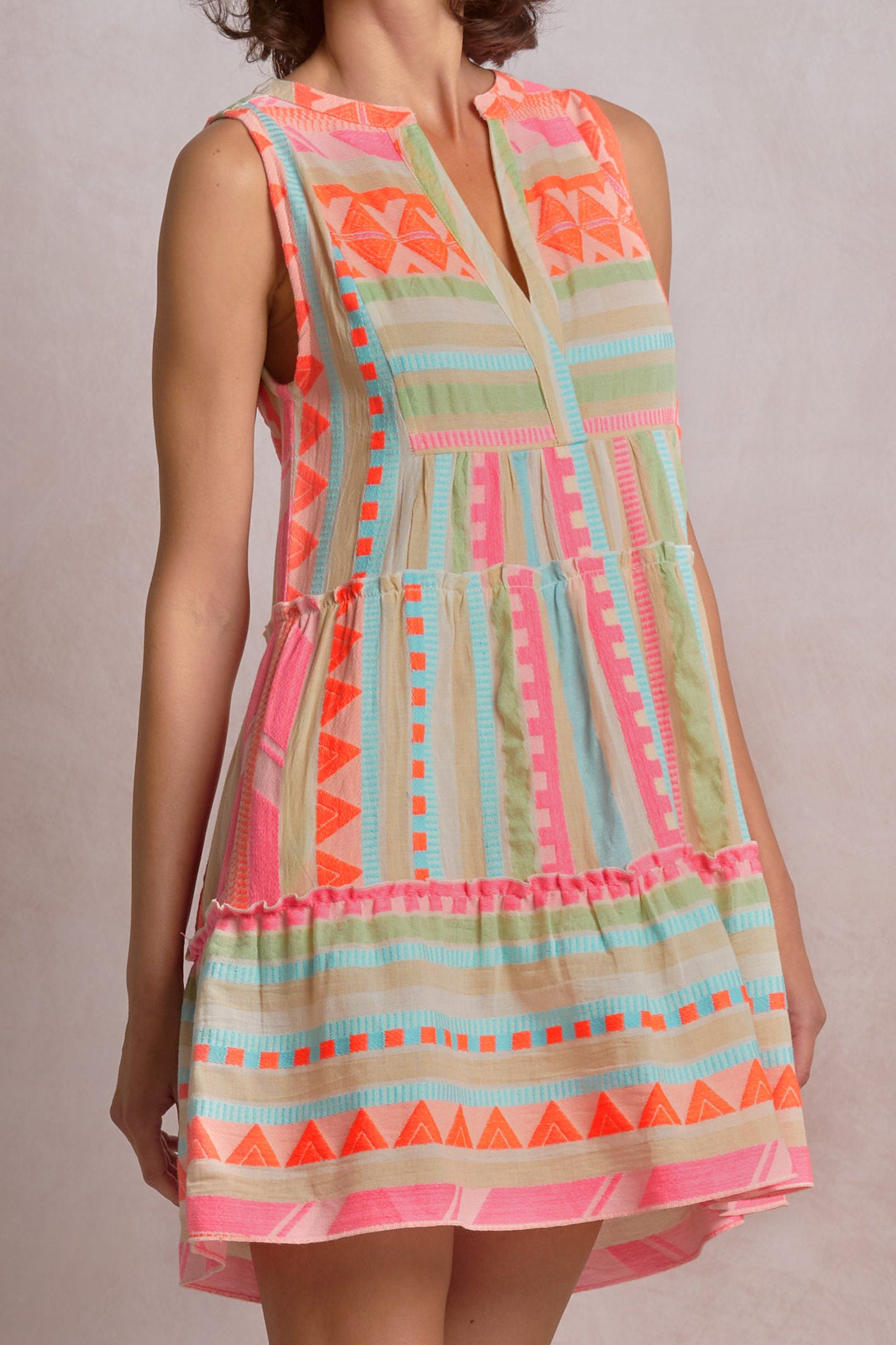 close-up of a colorful printed sleeveless short dress 