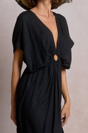 Woman wearing a black dress