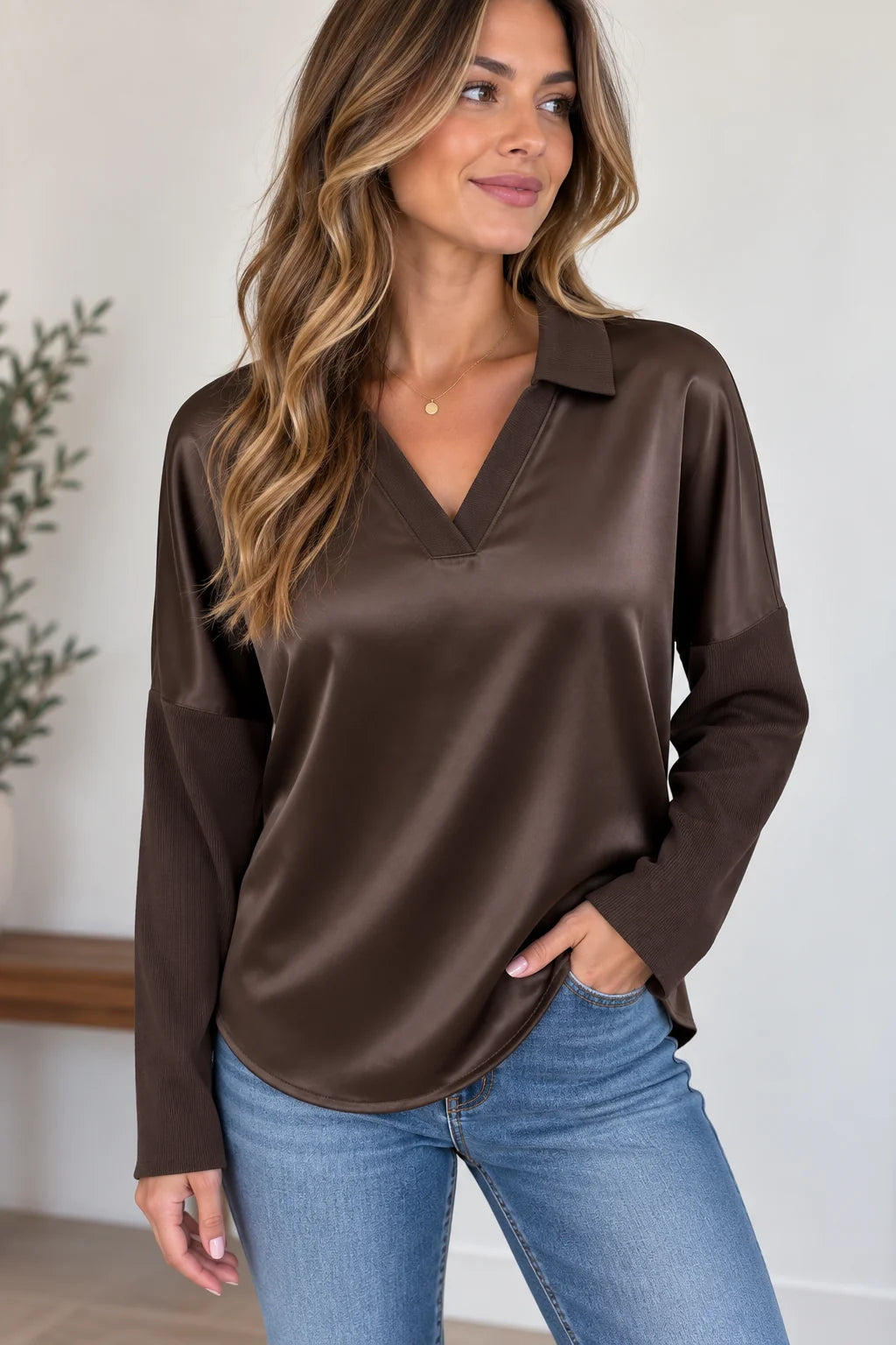 woman wearing brown v neck satin knit long sleeve 