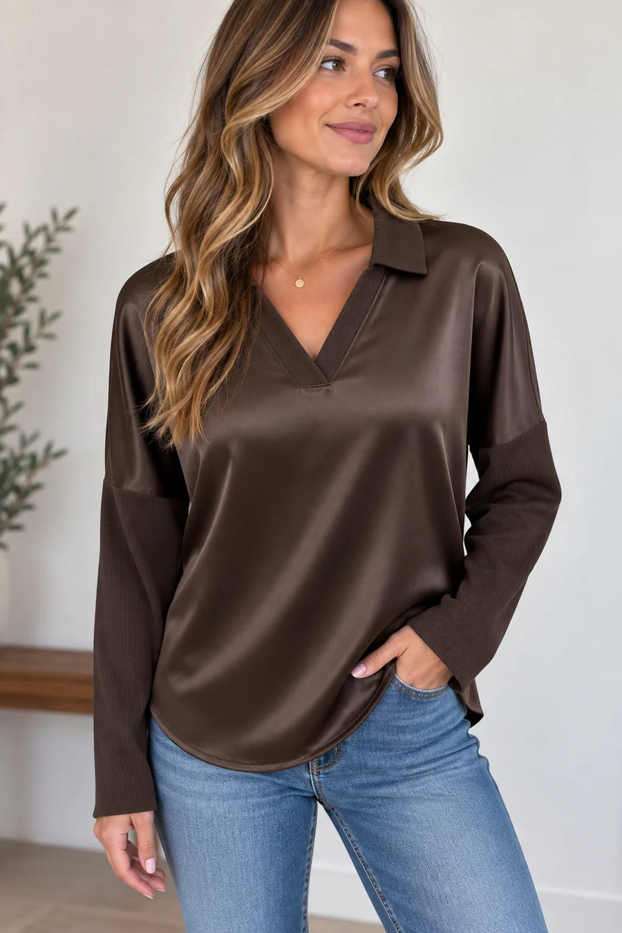woman wearing brown v neck satin knit long sleeve 