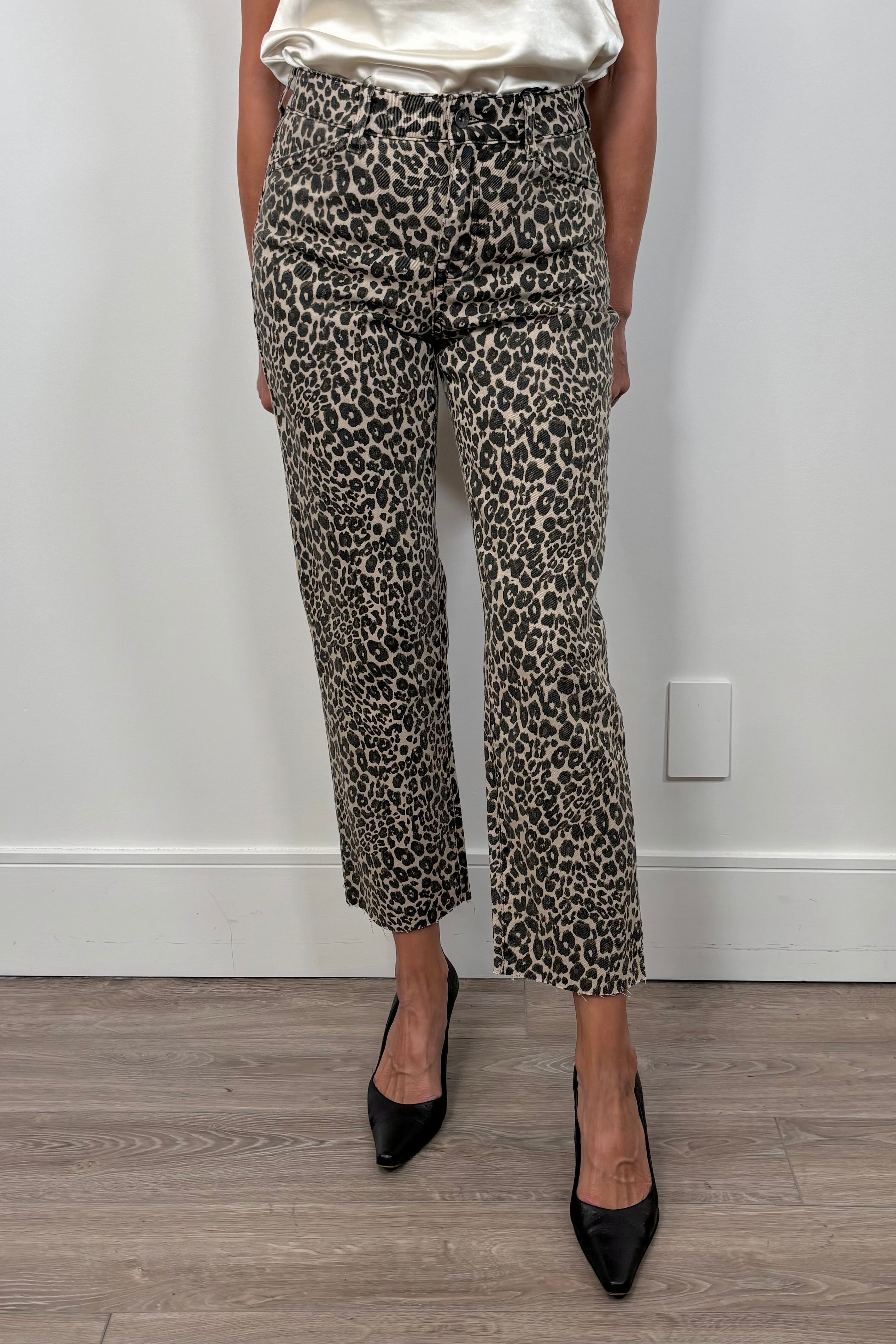 woman wearing a crop pair of leopard print jeans