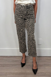 woman wearing a crop pair of leopard print jeans