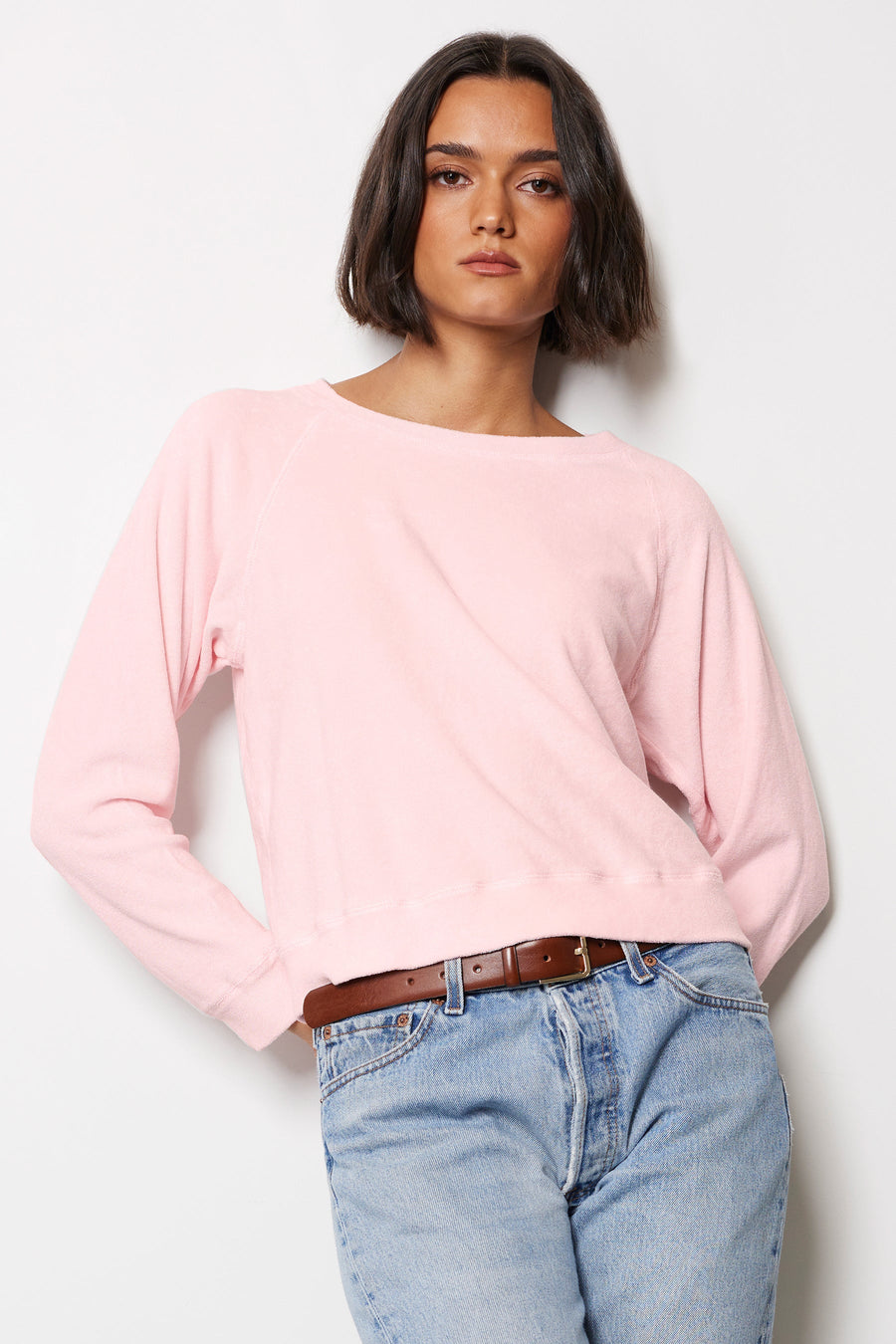 Person wearing a pink pull over