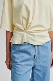 Butter yellow top with twist detail and wide sleeves