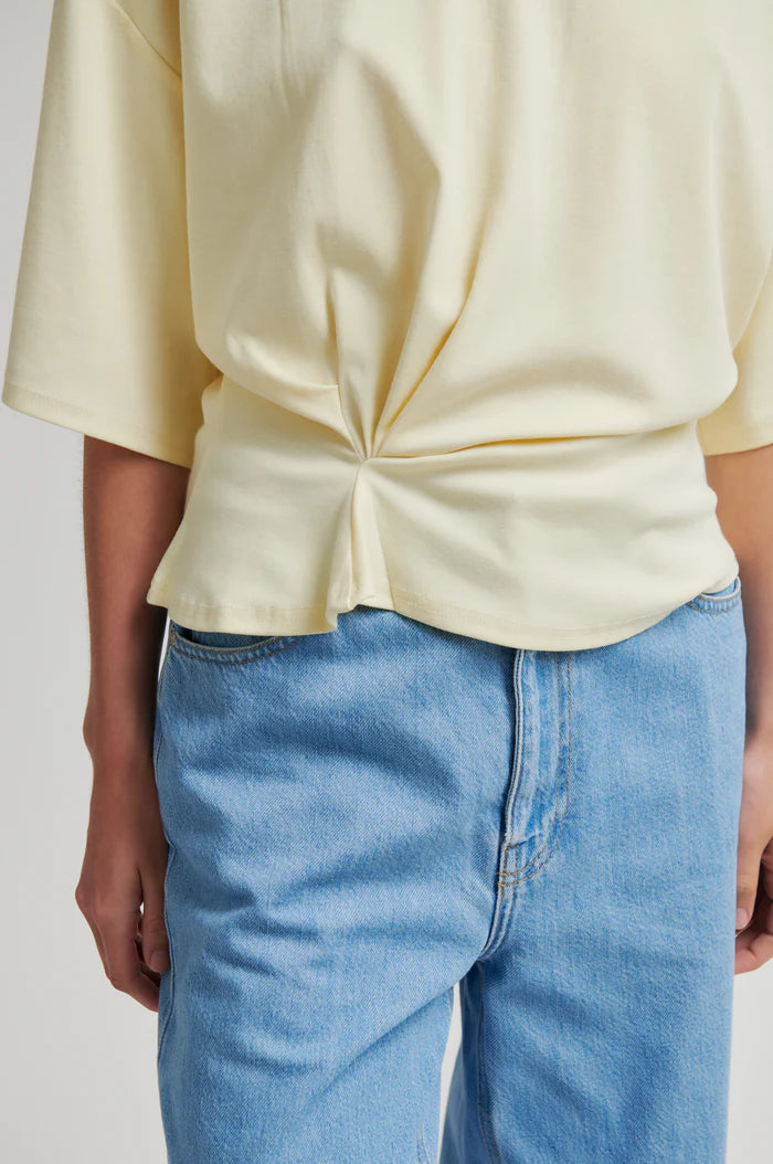 Butter yellow top with twist detail and wide sleeves