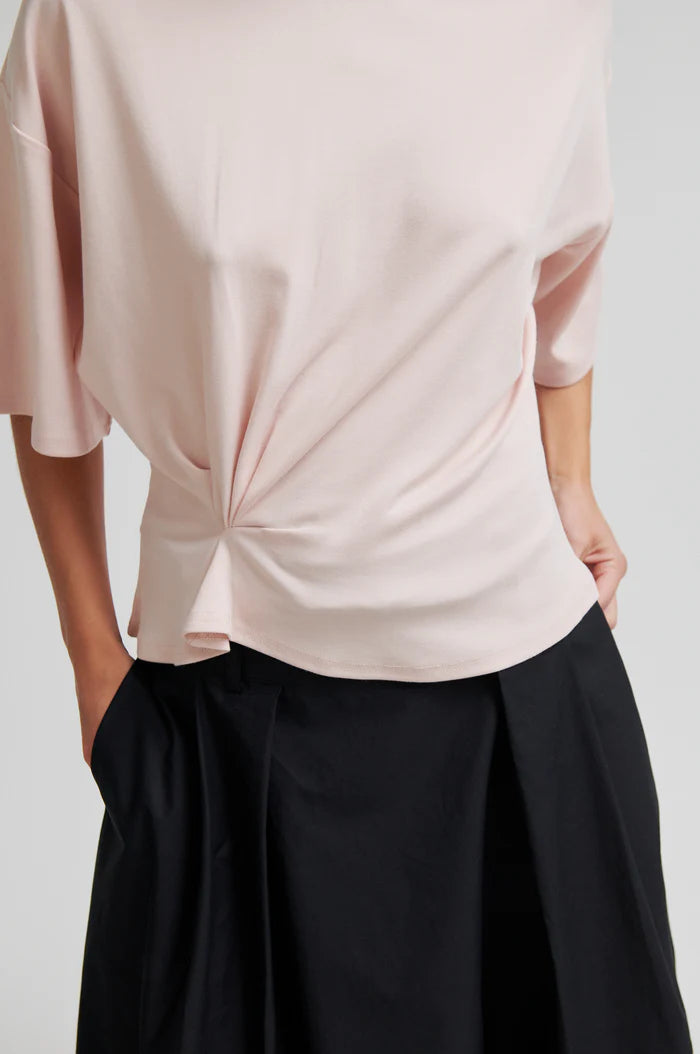 Light pink tee with twist detail and wide sleeves