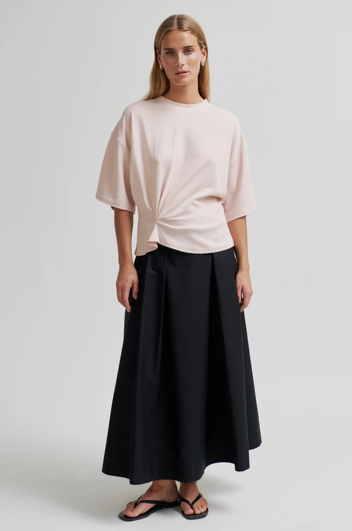 Light pink tee with twist detail and wide sleeves