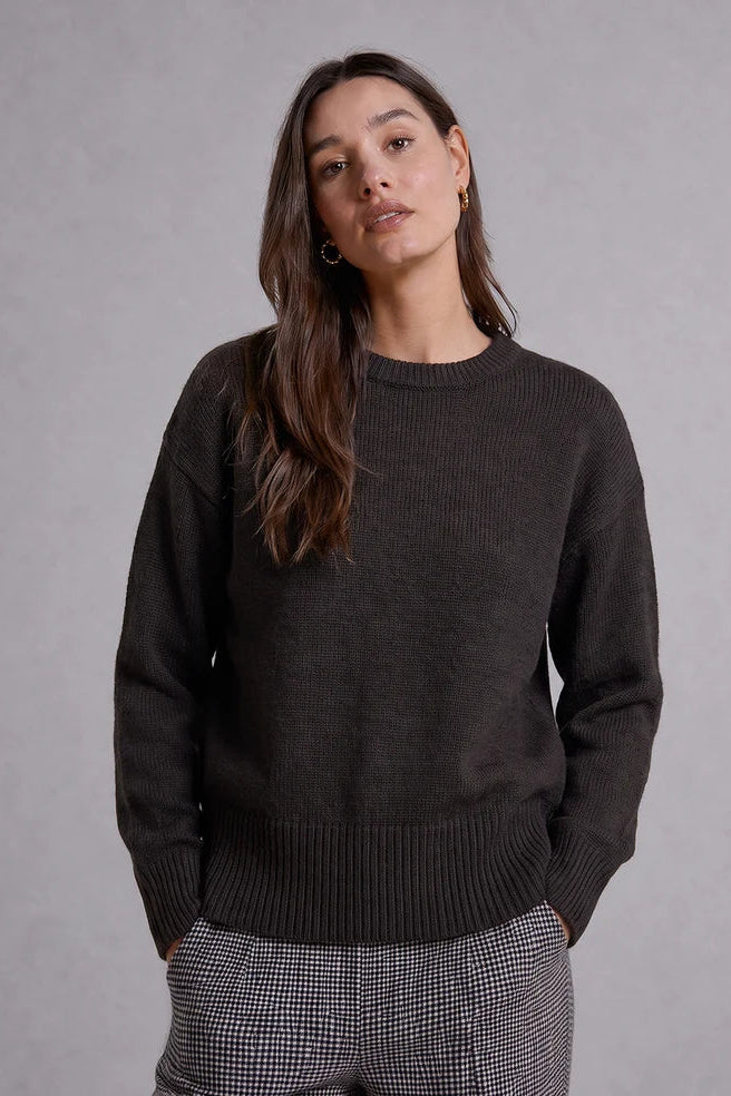 woman wearing brown knit crewneck sweater 