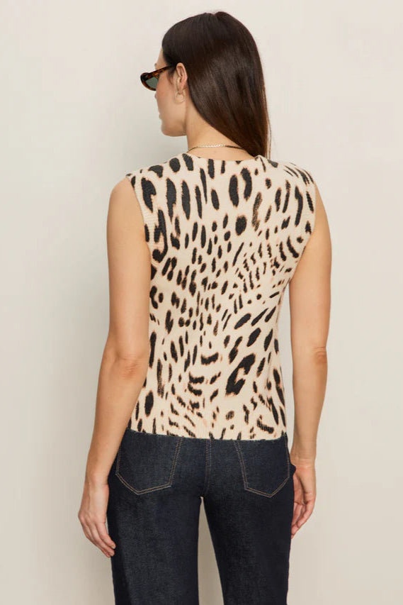 Back view  of woman wearing a knitted leopard print shell 
