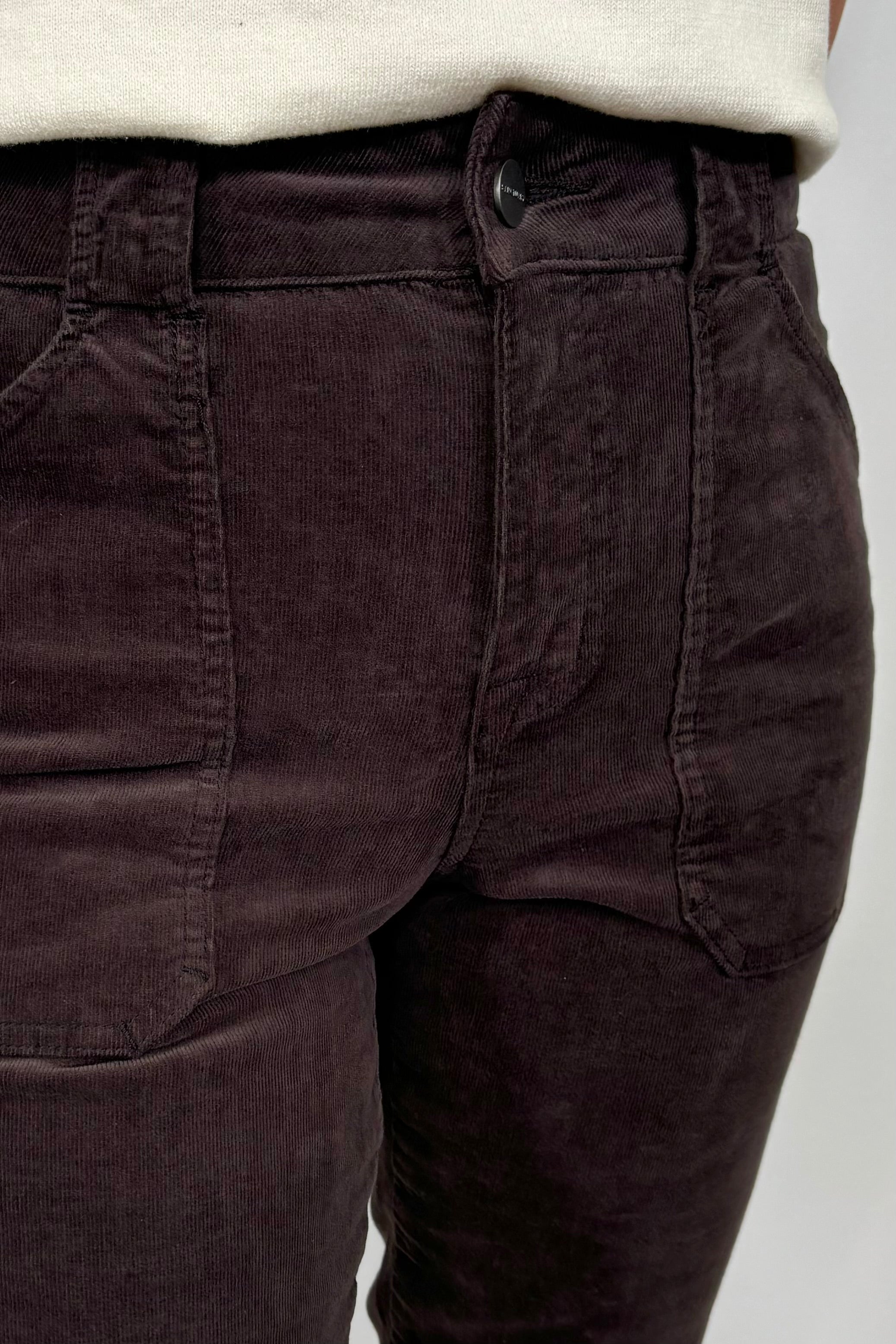 close-up of a fitted flared corduroy brown pants
