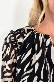 close-up of a lined animal pint chiffon blouse