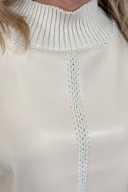 Close-up of of a sleeveless mix media tank top