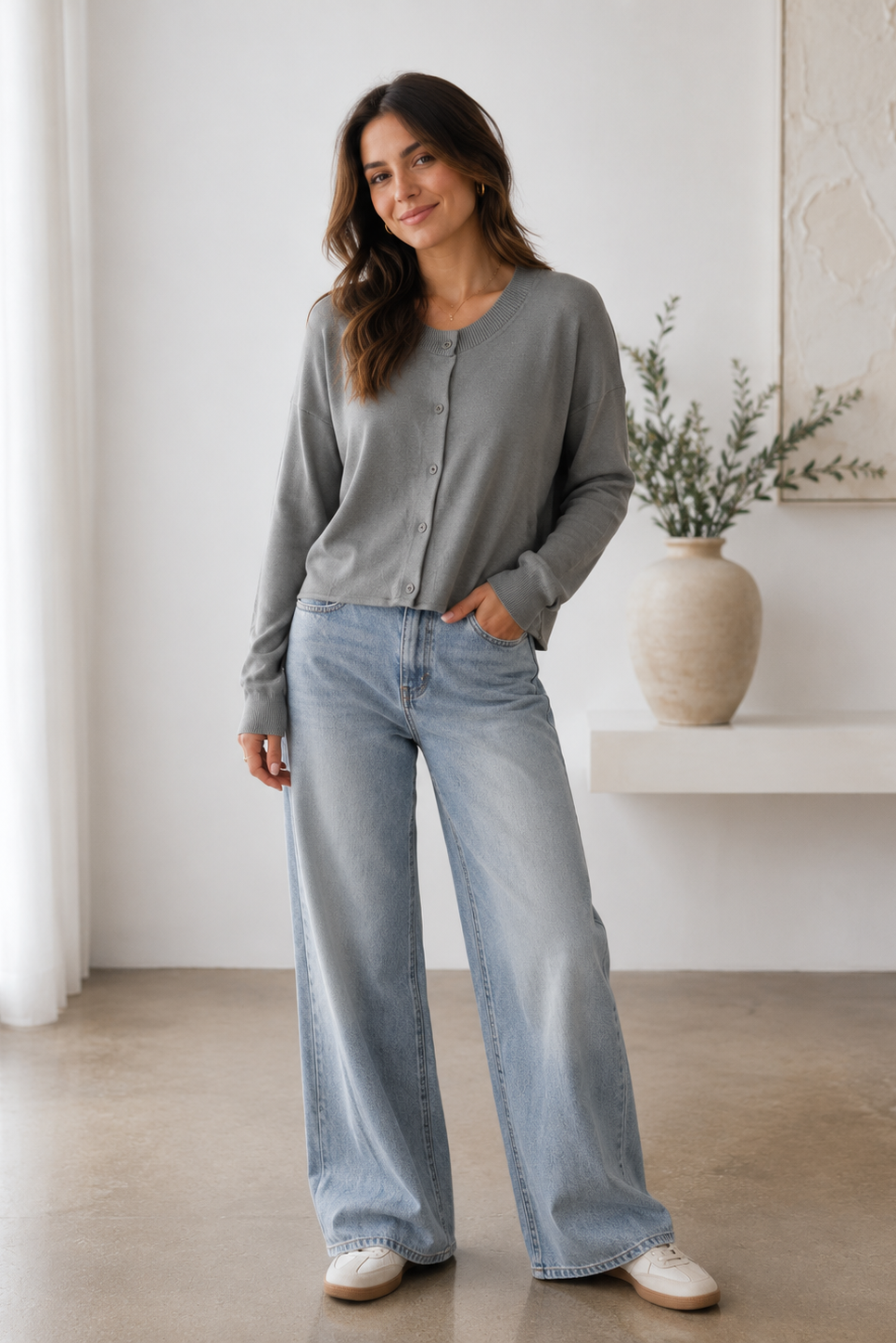 women wearing a grey button up sweater 