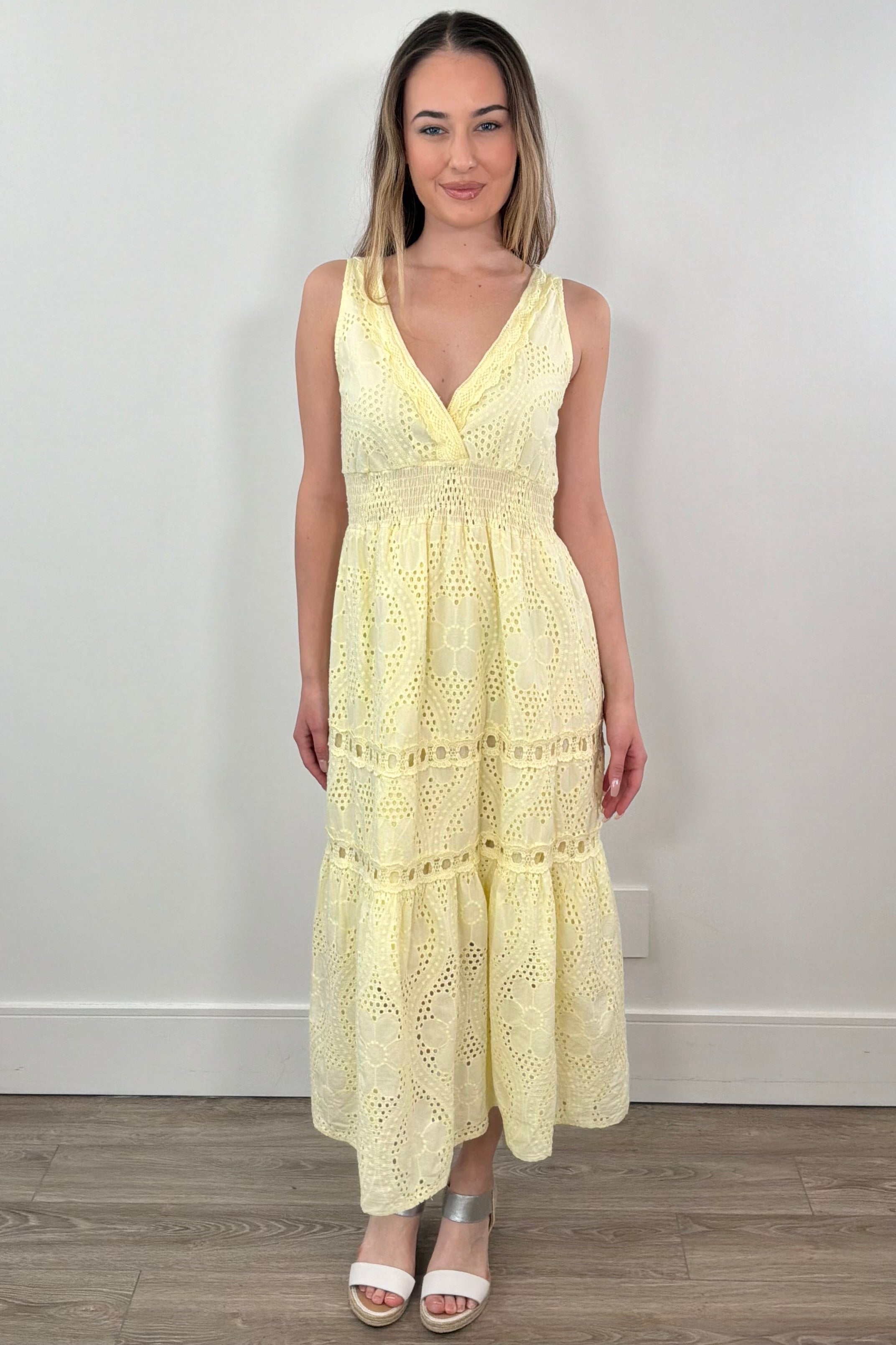 Woman wearing knit yellow dress