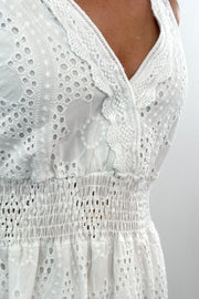 Close up of Woman wearing knit white dress
