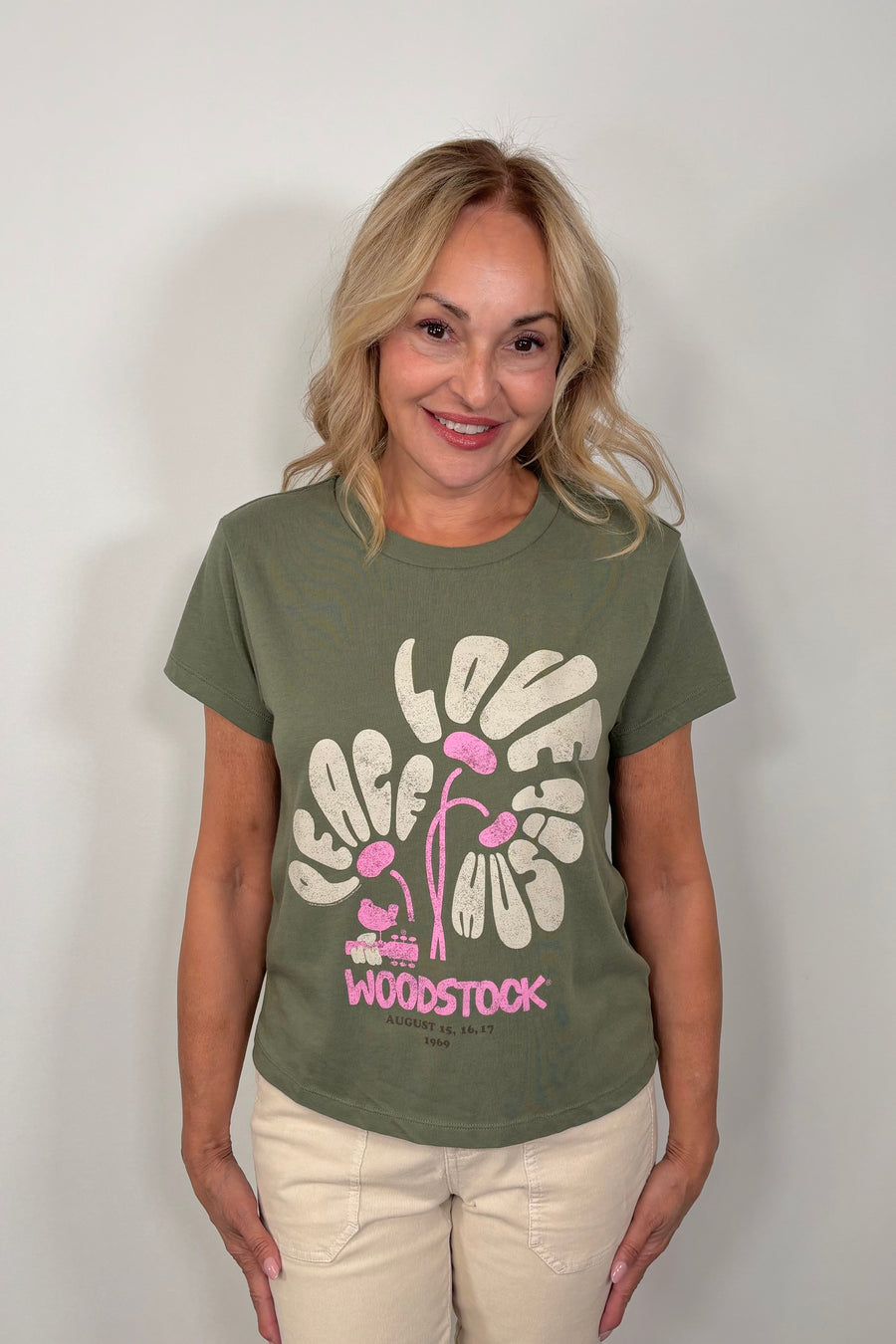 woman wearing a woodstok-festival printed tee