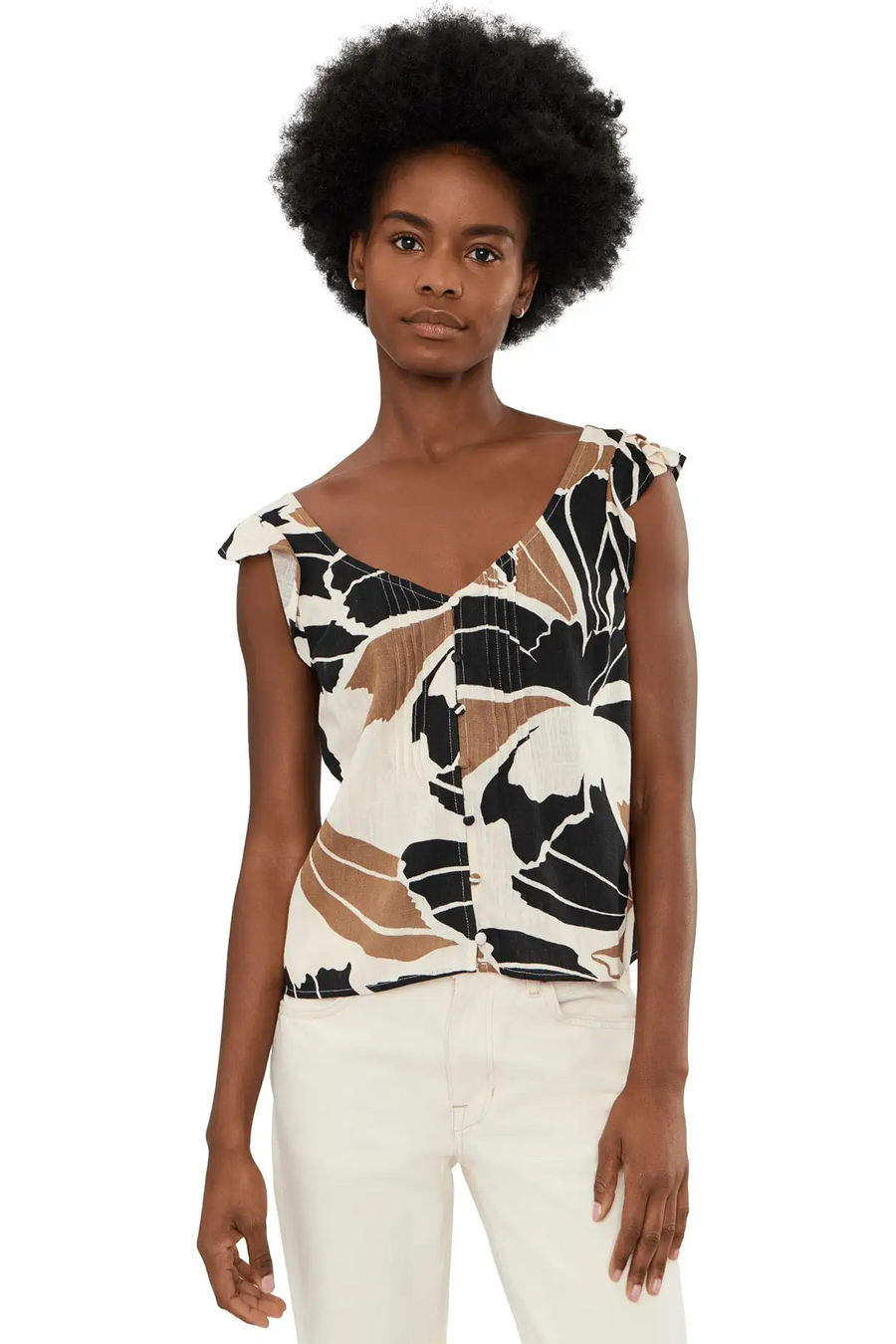 Woman wearing a sleeveless linen top with lotus pattern