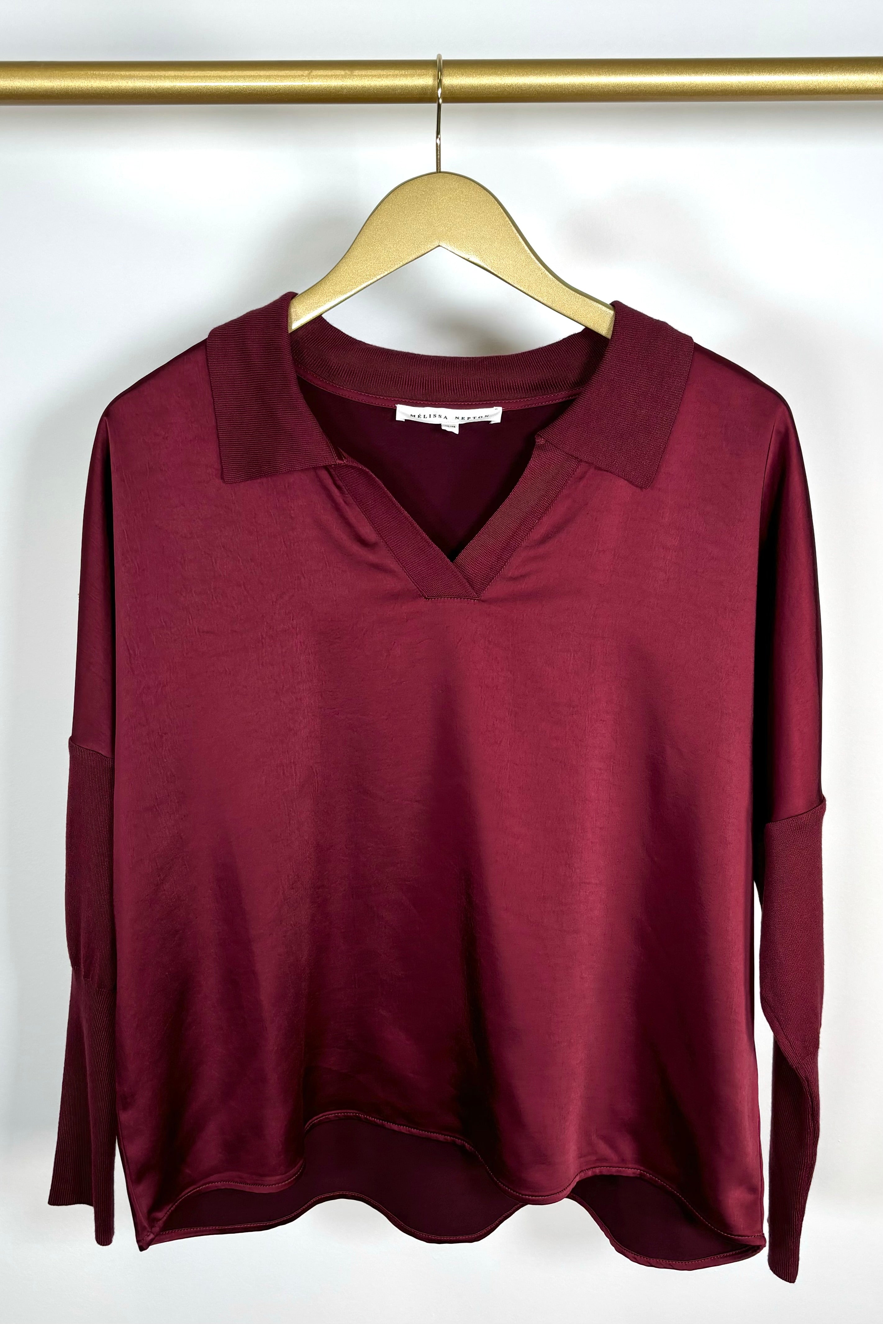 Front view of a red wine long sleeve satin collar top