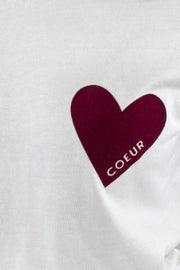 White shirt with a maroon heart and 'COEUR' text on a white background