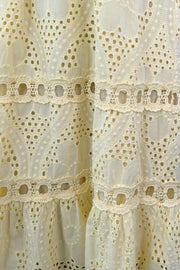 Close up of Woman wearing knit white dress