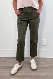 Green pants with large front pockets. 