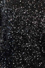 close-up of an oversized black sequin top 