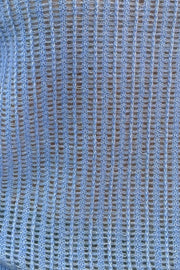 close-up of a blue open knit cashmere sweater 