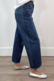 woman wearing an ankle soft barrel blue jean