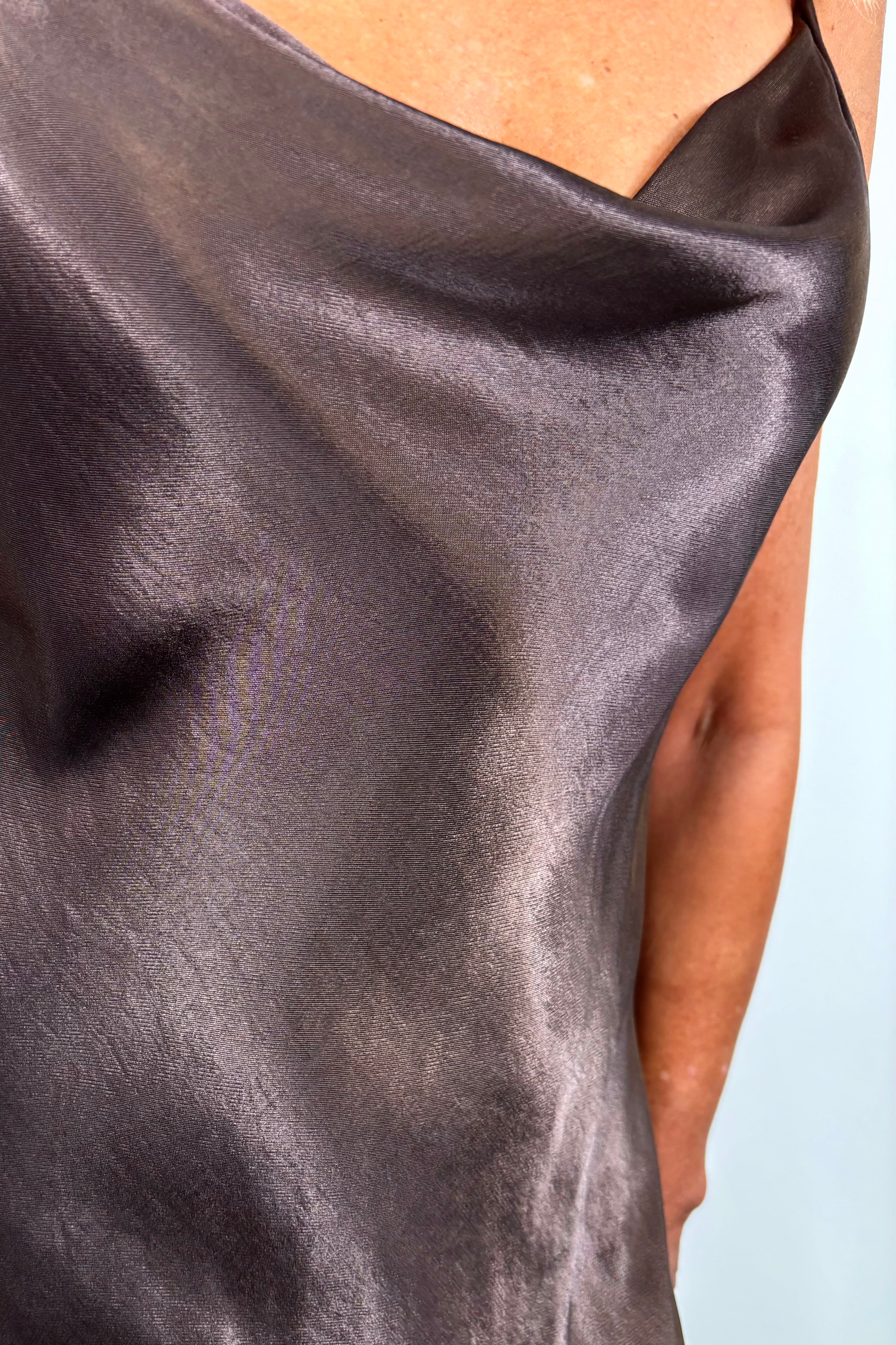 close-up of a brown slip on satin maxi dress