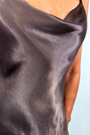 close-up of a brown slip on satin maxi dress