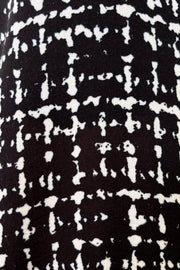 Close-up of a black and white grid patterned fabric