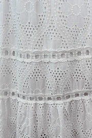  Close up of Woman wearing knit white dress
