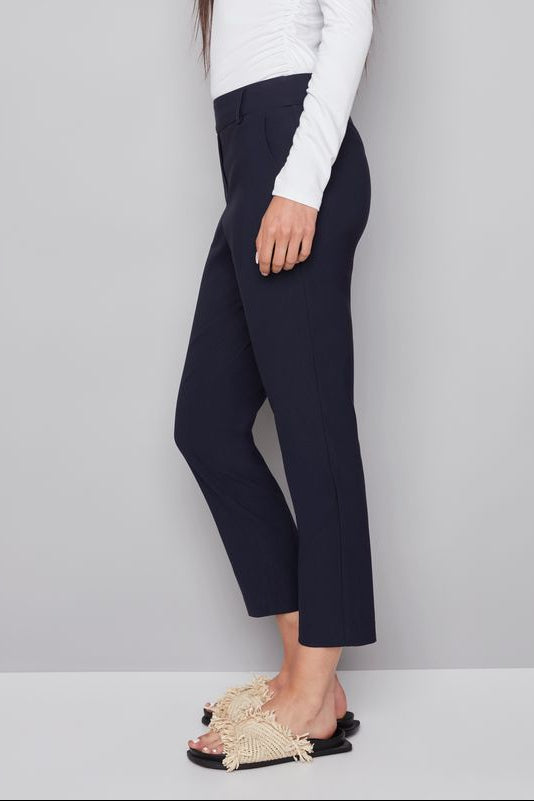 woman wearing a navy blue ankle pant