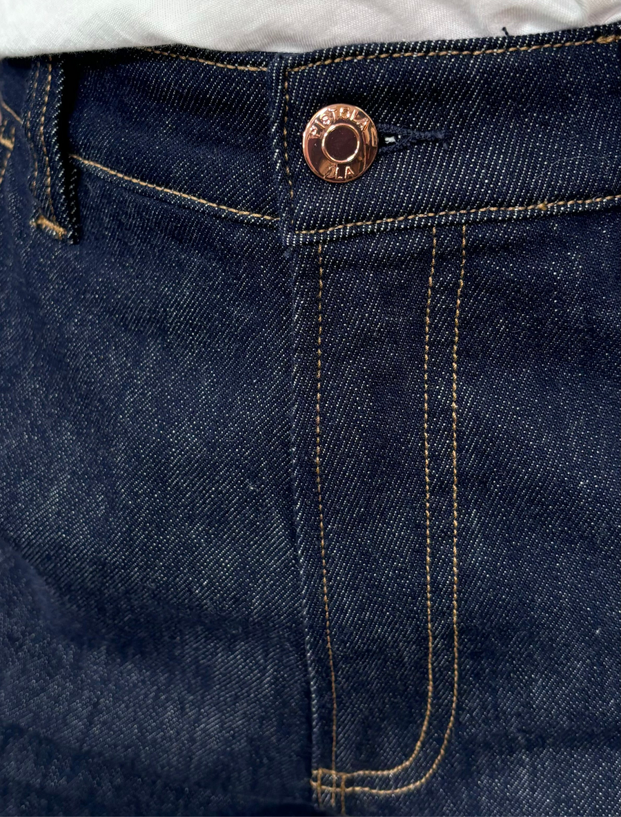 close-up of a dark wash jean