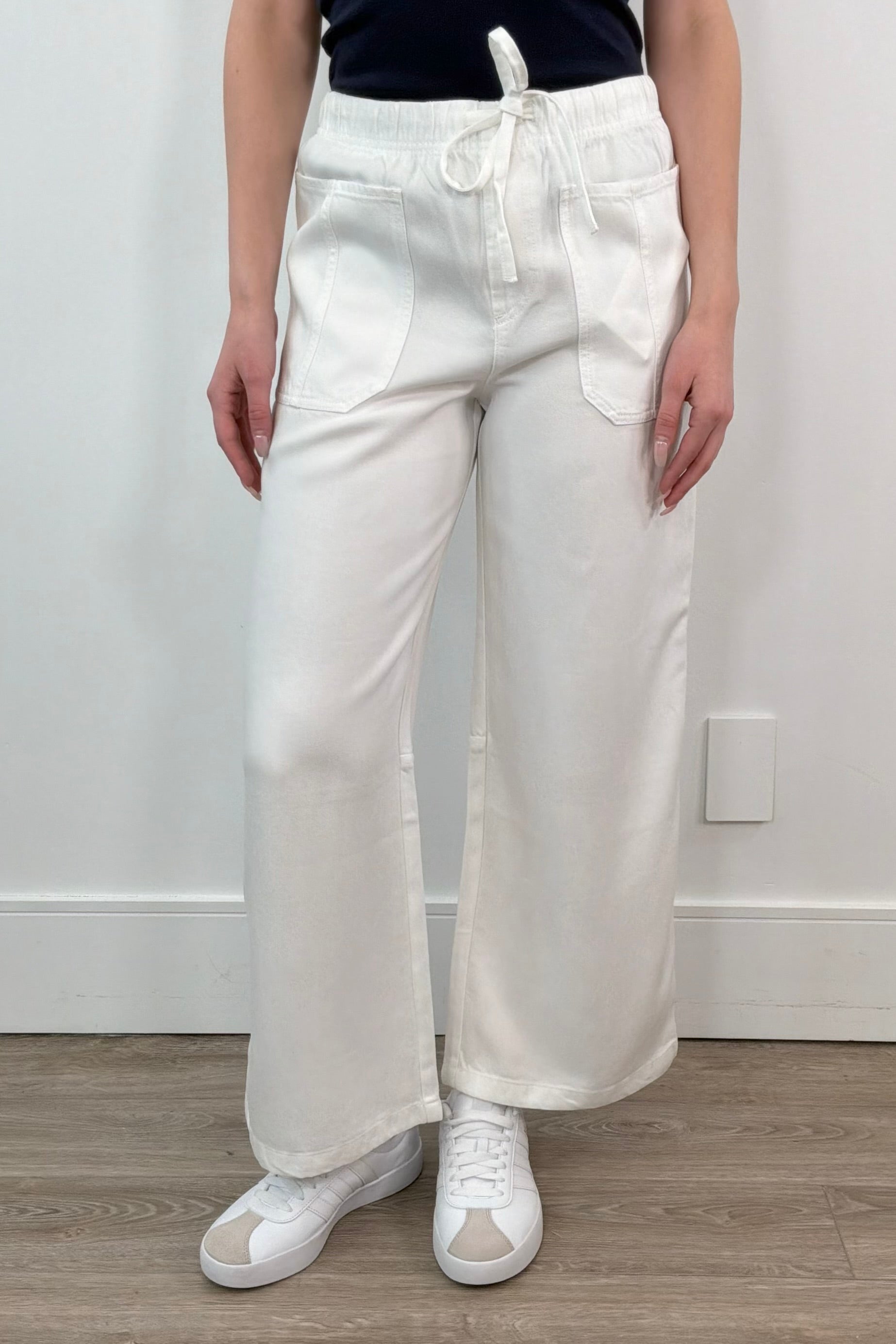 woman wearing a white tencel denim pants