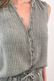 sleeveless button-front top in textured gauze fabric, button detail