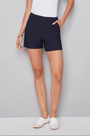 woman wearing a navy blue pull on shorts