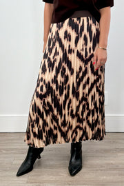 Person wearing a leopard print maxi skirt