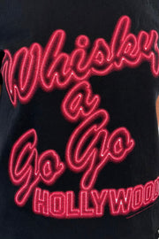 close-up of a black graphic t-shirt with red text